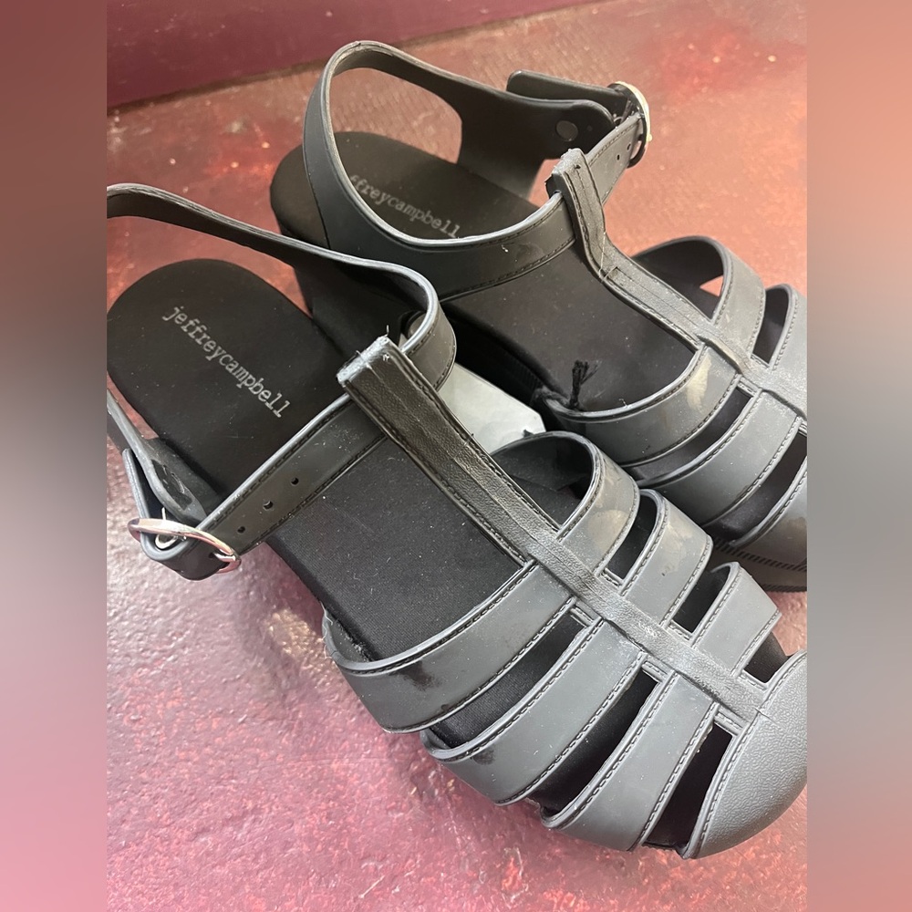 Jeffrey Campbell jellied fisherman matte black platform sandals.